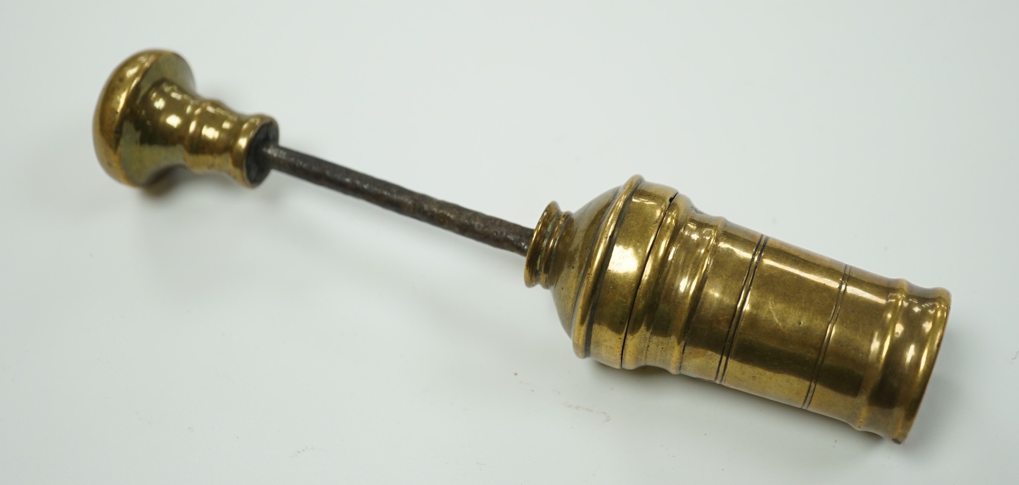 An early 19th century brass travelling pestle and mortar, 11.5cm